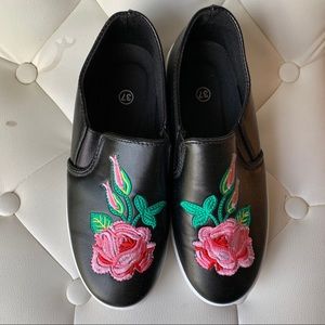 Faux leather slip ons with embroidery